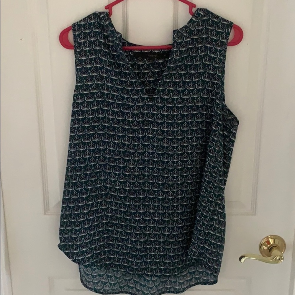 Green tank with leaf pattern